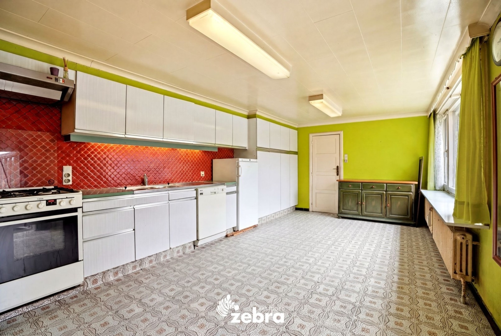 Ruime woning met 4 slaapkamers en tuin te Oostrozebeke!